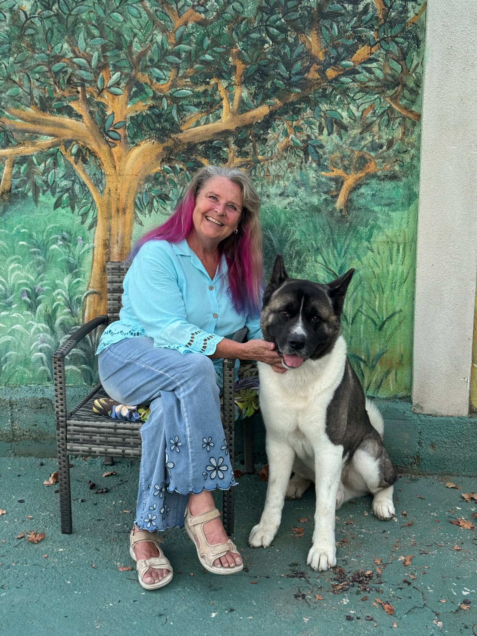 Mikki with the family dog in the garden